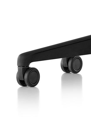 Close-up view of the base and castors on an Aeron stool