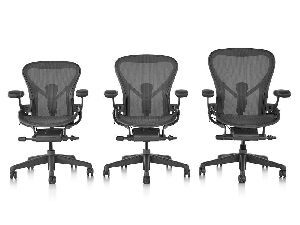 Herman Miller Aeron grahite line up showing the 3 different sizes A, B and C