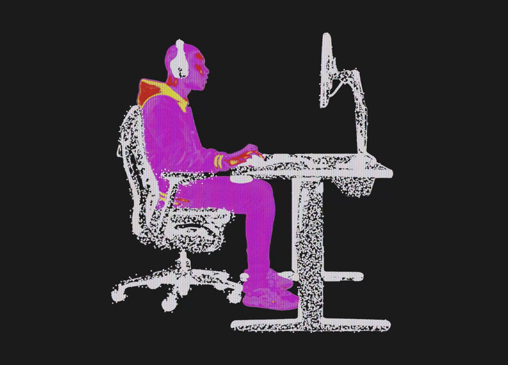 Wärmebildaufnahme einer Person, die in einem Embody-Gaming-Stuhl an einem Nevi-Gaming-Tisch mit Ollin-Monitorarm sitzt